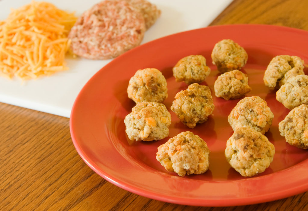 Sausage balls made with hot sausage and cheddar cheese.